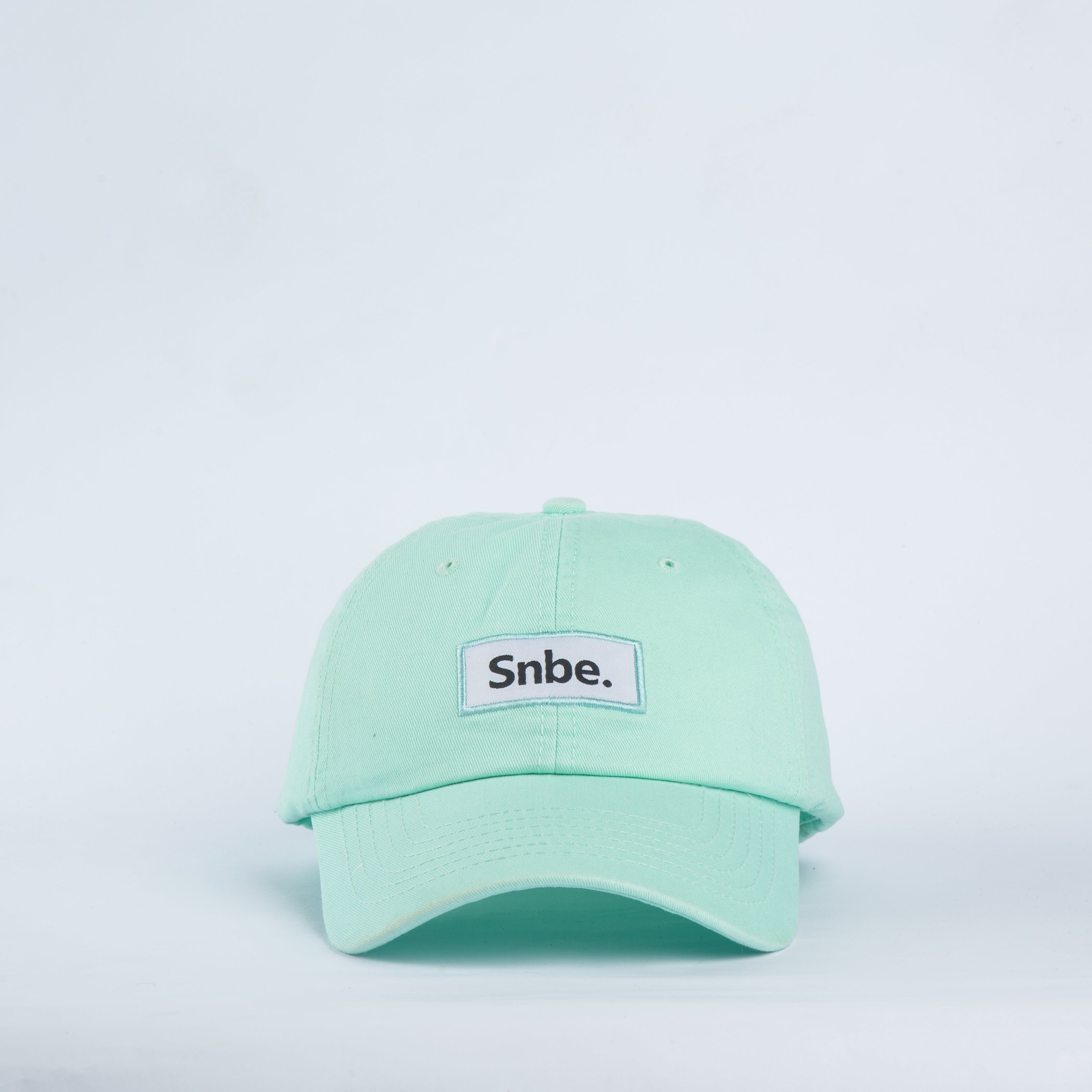 snbe- cotton Cap